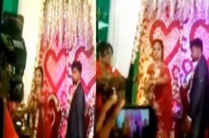 Bride throws away barfi groom tries to feed her
