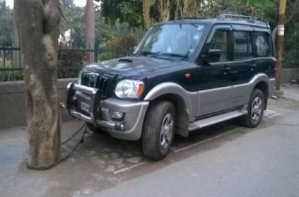 Anand Mahindra share picture of Scorpio tied tree with a chain