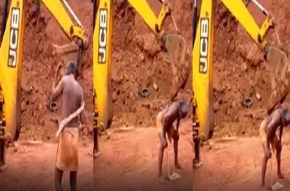 bizarre man uses jcb to scratch his back funny viral video