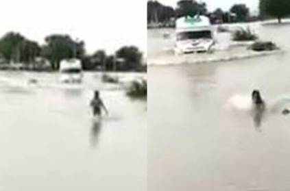 Boy guides ambulance over flooded bridge in Karnataka