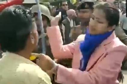 CAA supporters pulls hair of Collector Priya Verma video
