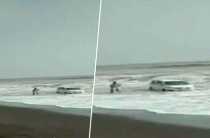 Car Lashed by Waves After Getting Stuck in Sand