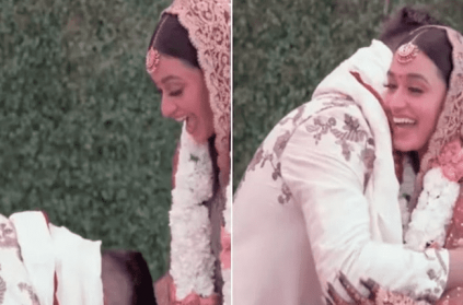 Desi groom touches bride feet during wedding ceremony