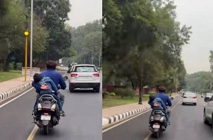 father prevents son falling from bike netizens emotional