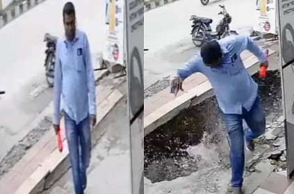 footpath cracks seconds after man walks on it and cross