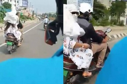 husband caught his wife with her lover in two wheeler