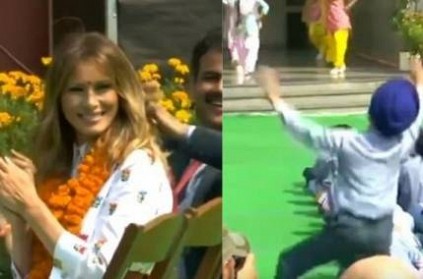 Melania Trump watches a dance performance by students at Sarvodaya