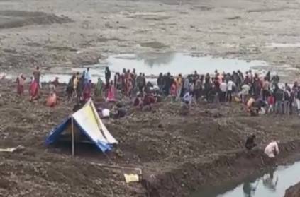 mp villagers dig up river in search of gold and silver coins