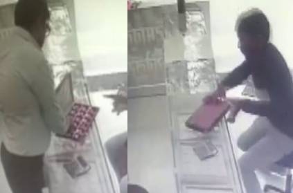 mumbai cctv footage of man stole jewels from the shop
