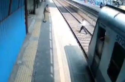 mumbai cop saves elderly man from getting crush in train
