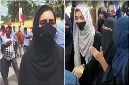 Burqa-clad college girl confronts men in saffron shawls