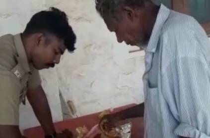 Kerala Police officer shares his food with hungry man video