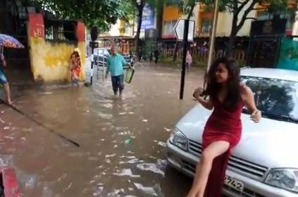 woman poses in flooded street, Instagram photos goes viral