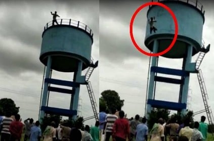 WATCH: Man jumps off water tank after wife refuses to return