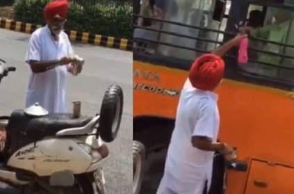 WATCH: Old man providing free drinking water to the commuters in Delhi