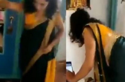 Woman dressed to attend wedding called to catch a snake Video