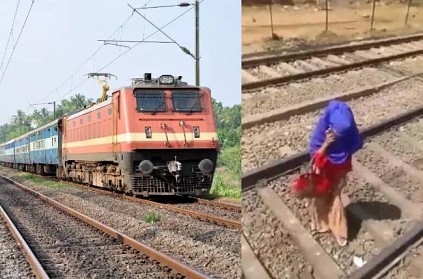 woman lying on railway track calmly speaks on phone