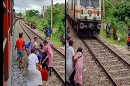 Women cross track while train arrives video goes viral