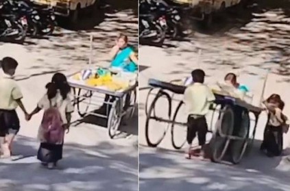 children helps lady to push fruit cart up heartwarming video