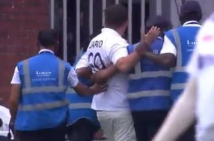 Fan with Indian jersey enters playing area at Lord’s