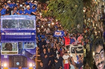 MI players celebrate the victory by roam around Mumbai in the open bus