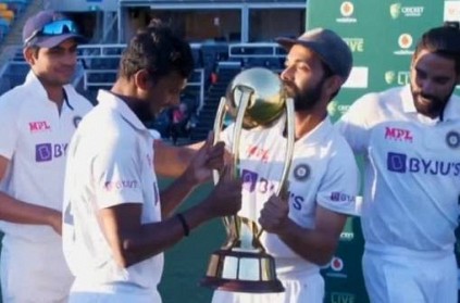 Rahane handed over test series winning trophy to Natarajan