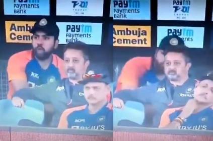 Rohit Sharma caught eating and hiding behind support staff member