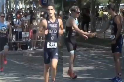 spain athlete stops at finishing line makes opponent win