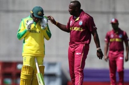 Usman Khawaja struck on helmet by Andre Russell Bouncer