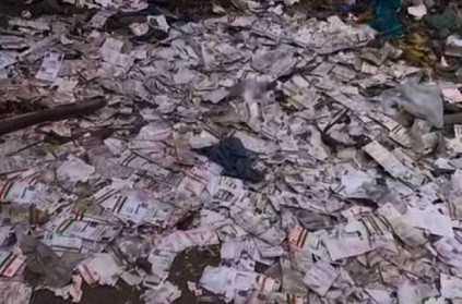 aadhaar card is dropped in the dustbin near the river in thiruvarur
