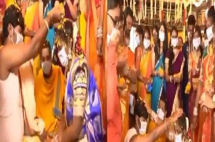 andhra couple marriage with mask owing to coronavirus outbreak