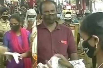 Chennai Police offers jewel safety mask in TNagar shopping public