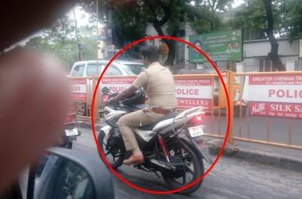 chennai SI suspended due to not wear the helmet while driving