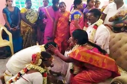 Daughter gets married in front of her father statue