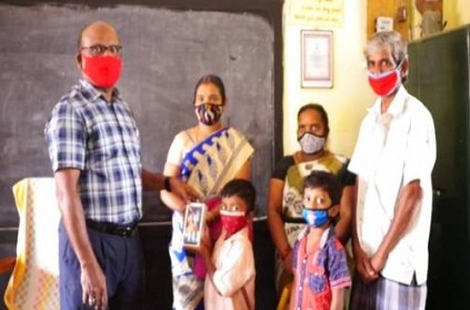 Govt School Head Master gives mobile to Each Student Out Of His Pocket