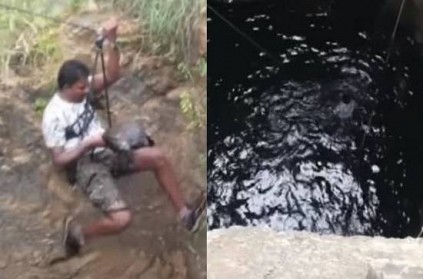 Man climbs down snake infested well to save drowning peacock
