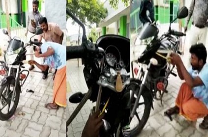 Snake rescued from govt teacher bike in Tirupur