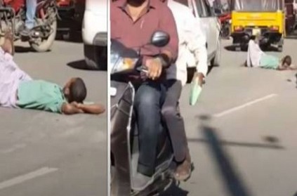 TN drunken man lies on middle of the public road goes viral