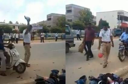 traffic police breaking motorists helmets, video goes viral