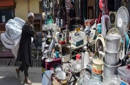 Afghan People sell their possessions extreme poverty