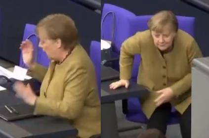 Angela Merkel panics as she forgets her mask during parliament session