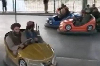Armed Taliban Fighters Seen Riding Bumper Cars At Amusement Park