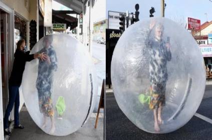 australia man inside mega size ball protect corona virus
