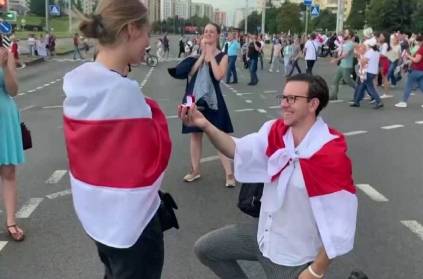 belarus man proposed woman amid protests video gone viral