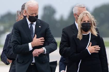 biden ripped for glancing at watch ceremony fallen troops