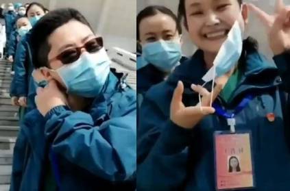 China medical workers celebratingb the last moment