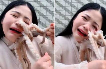 chinese blogger tries to eat a live octopus on camera viral video