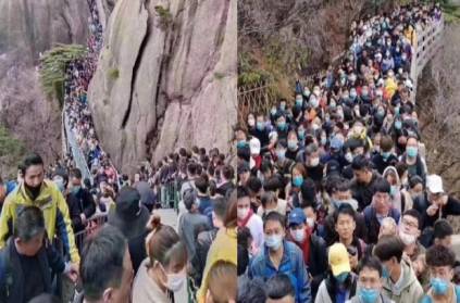 Chinese people with terrific crowds at tourist sites