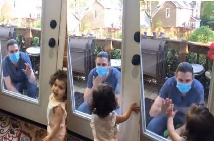 doctor consoling his affectionate baby via glass gate viral video