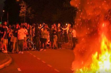 dutch protesters burn tyres afghan refuees house netherlands
